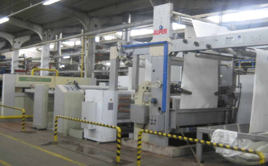 Open Width Stenter Range machine in operation on the factory floor